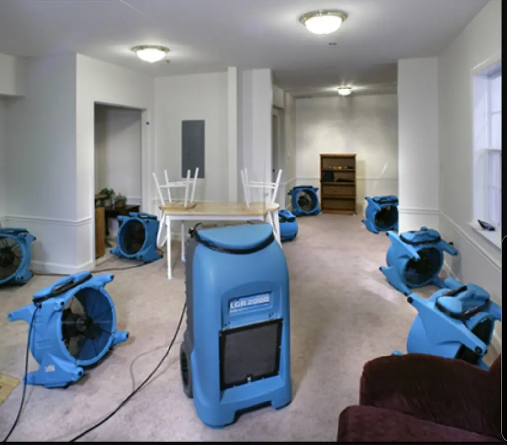 Air movers and dehumidifier setup for Water Damage Restoration in Westchase